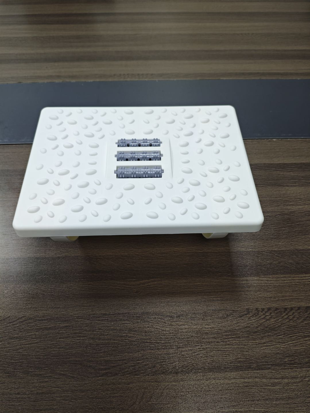 Rocking Foot Rest Massage With Rollers